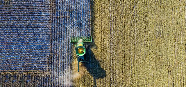 Aerial shot of green milling tractor by Tom Fisk